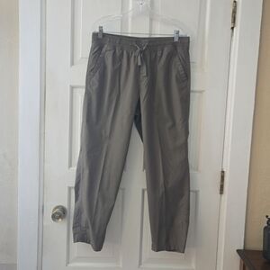 Slacks, olive green, slant pockets, drawstring, elastic waistband, slit at ankle